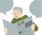 新聞を声に出して読む高齢男性